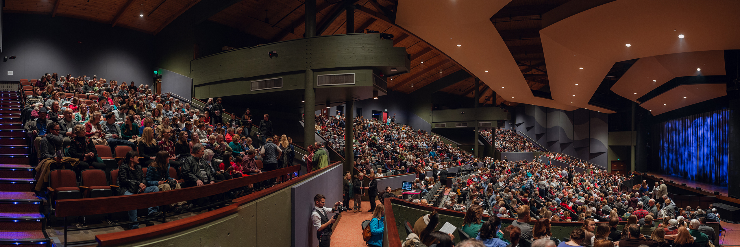 Patrons completely fill the seats of the Performance Hall.