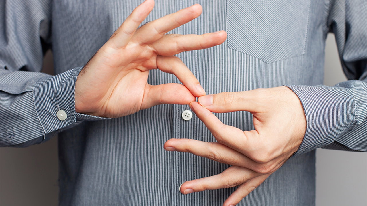 A pair of hands signing "friends."