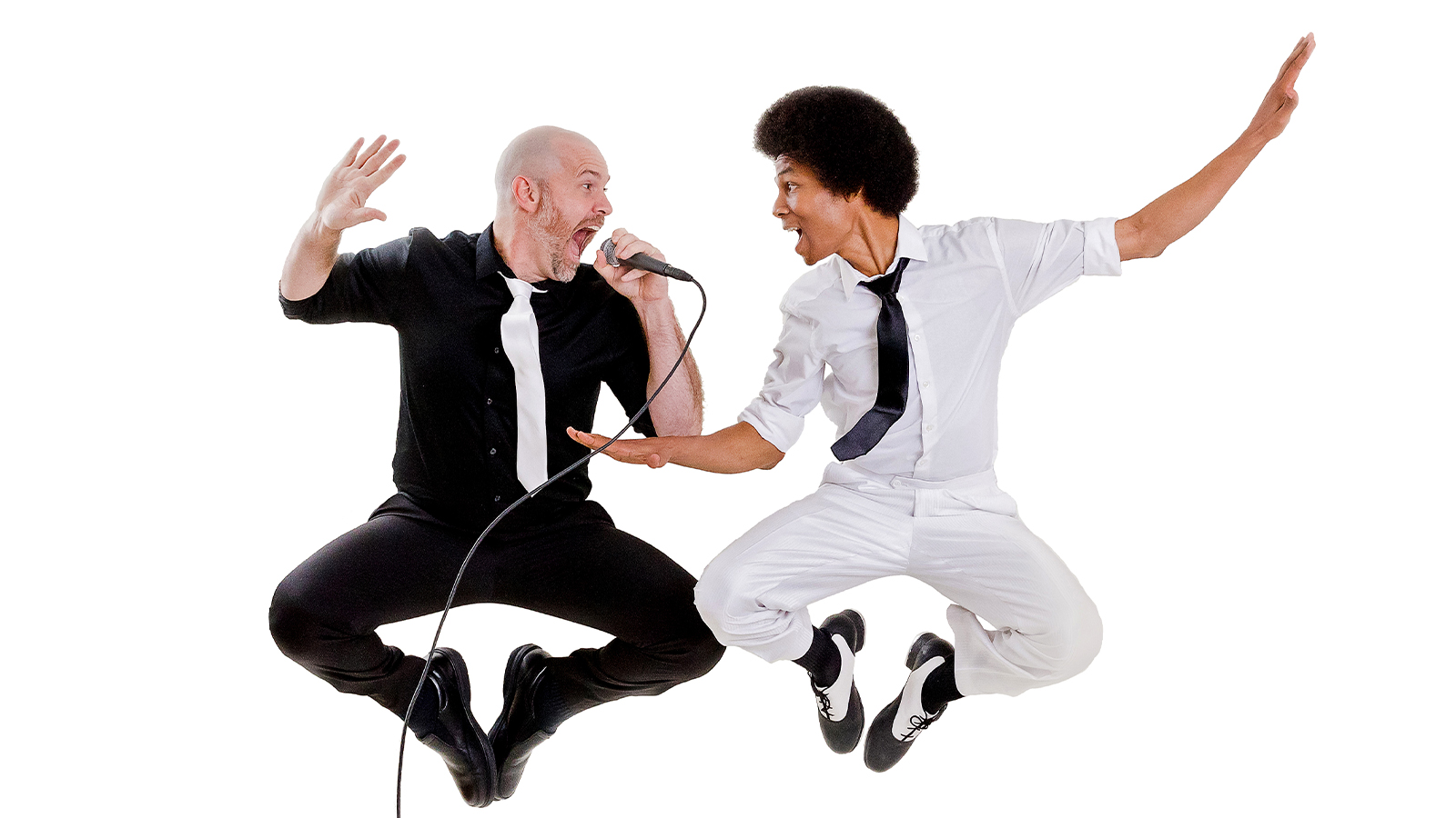 The Collision of Rhythm duo are jumping in the air with microphones